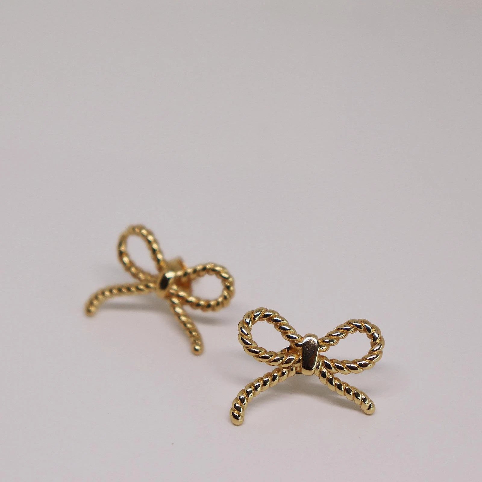 Twisted Ribbon Bow Stud Earrings